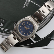 Załaduj obraz do przeglądarki galerii, Rolex Oyster Perpetual ref. 67230 - Blue 3-6-9 Dial - Oyster