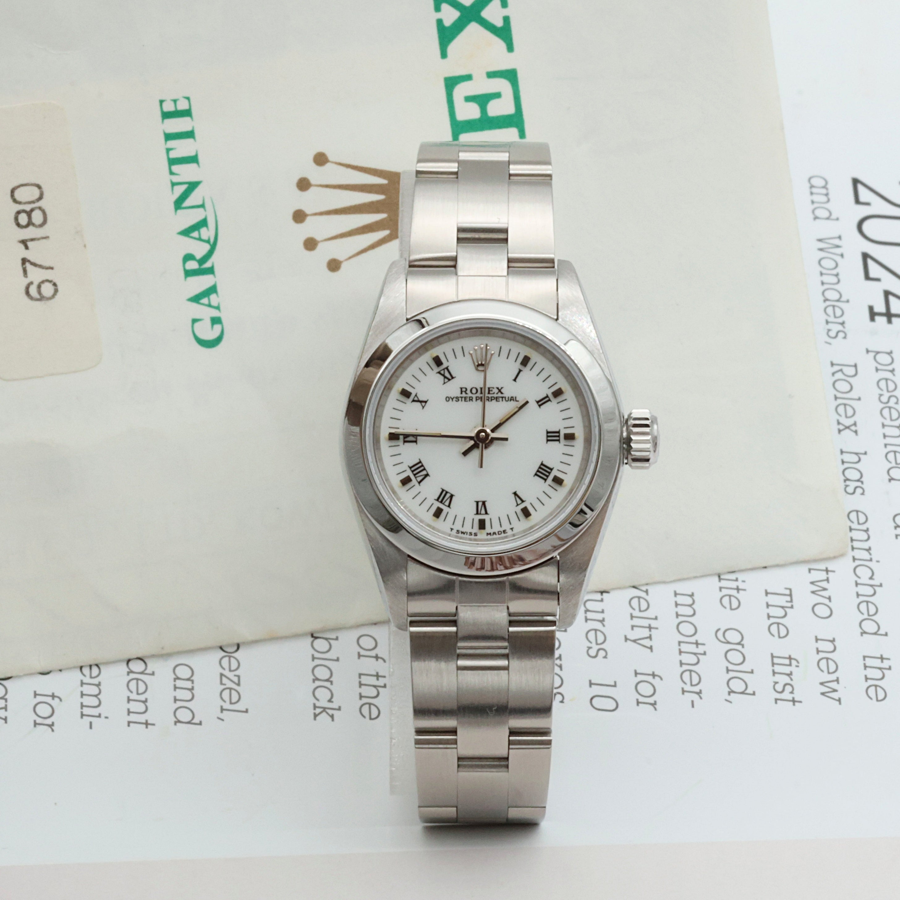 Rolex Oyster Perpetual ref. 67180 - White Roman Dial - Oyster Bracelet - Full Set