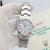 Rolex Date ref. 15200 White Roman Dial with Oyster Bracelet - Full Set