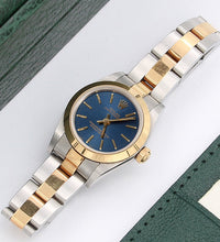Załaduj obraz do przeglądarki galerii, Rolex Oyster Perpetual Lady ref. 67183 Steel/Gold - Blue Dial Oyster bracelet
