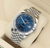 Rolex Datejust ref. 126300 Jubiläumsarmband mit blauem römischem Zifferblatt – komplettes Set